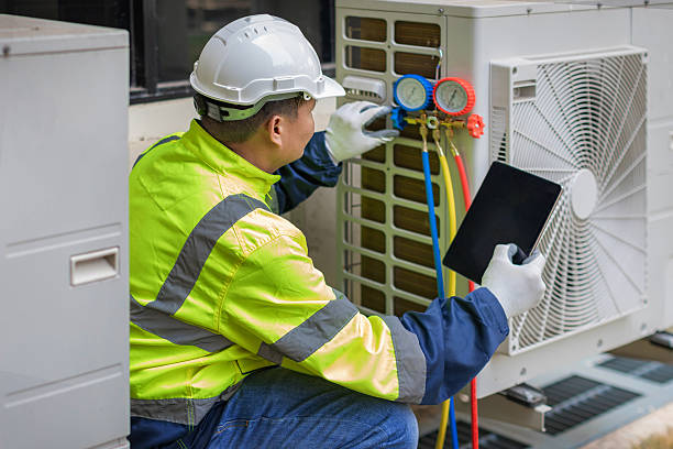 Professional Heat Pump Repair technician working in Johnson City, TX